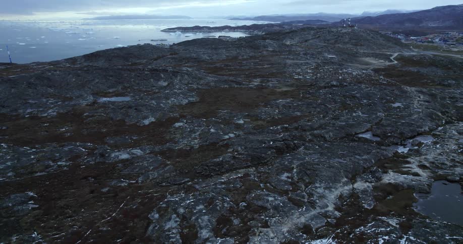 Ice floats on sea water and covers portions of land in thin threads