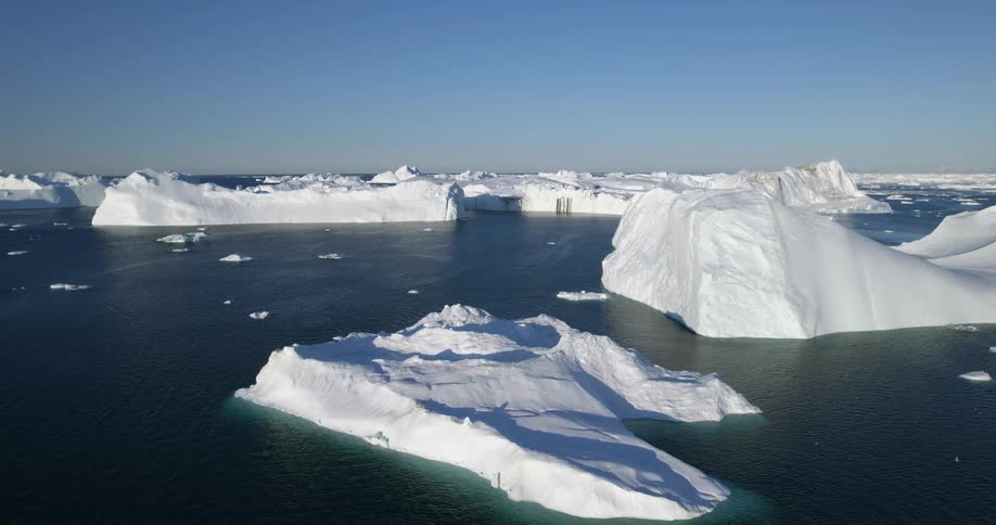 Icebergs are floating in the ocean water