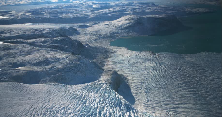 A arctic landscape with icebergs is displayed