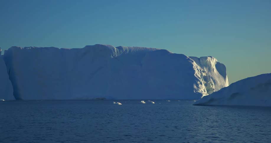 Icebergs are floating in the ocean water