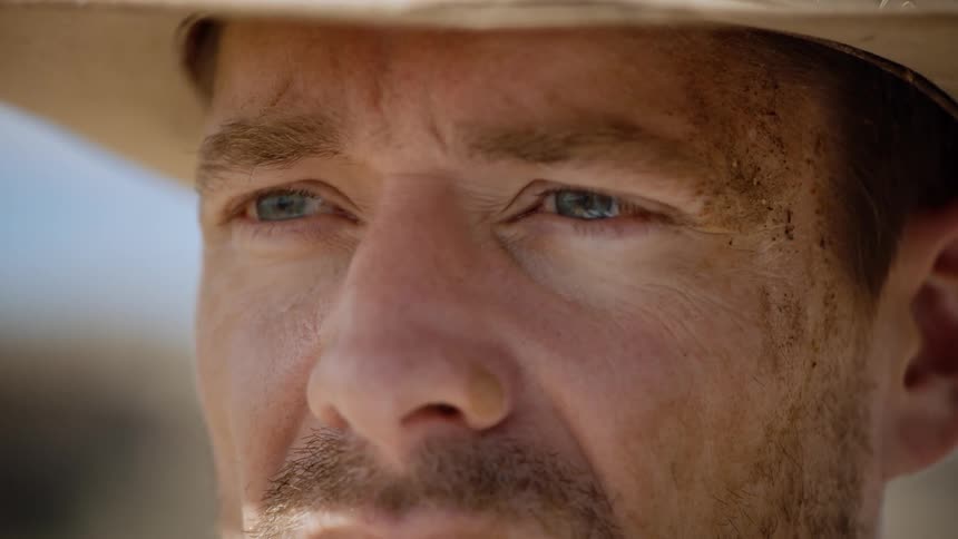 Close up of rugged man's dirty face