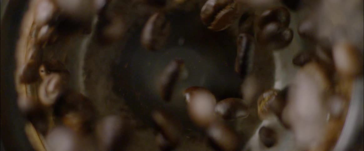 Coffee beans spinning in a blender