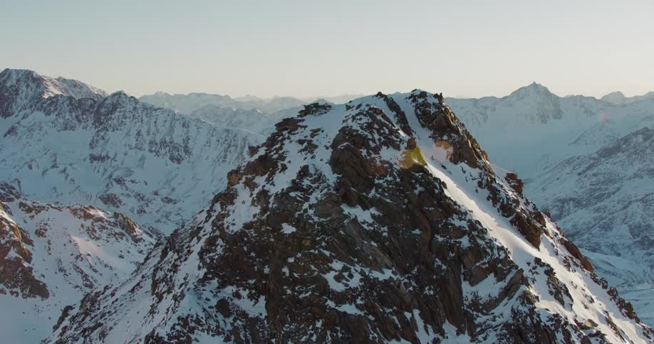 The peak of a snow covered mountain range