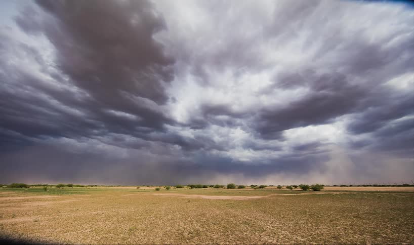 Time lapse of a storm moving in the distance