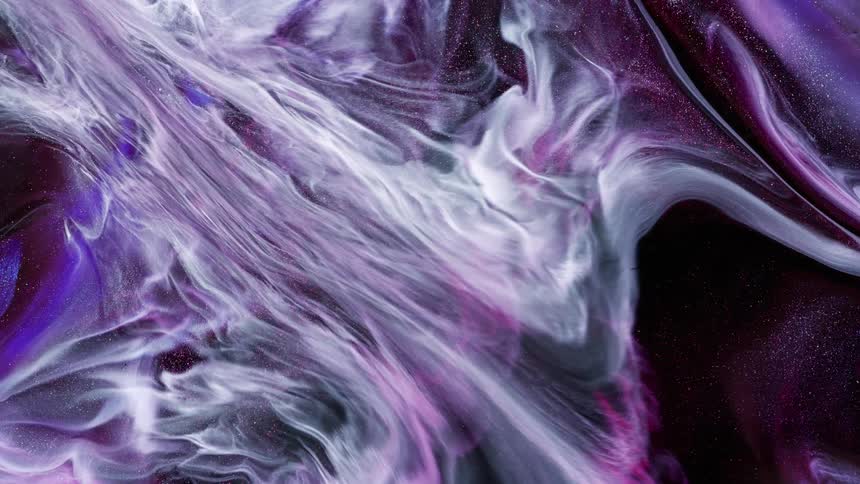 Purple and white swirls across a black screen with sparkles