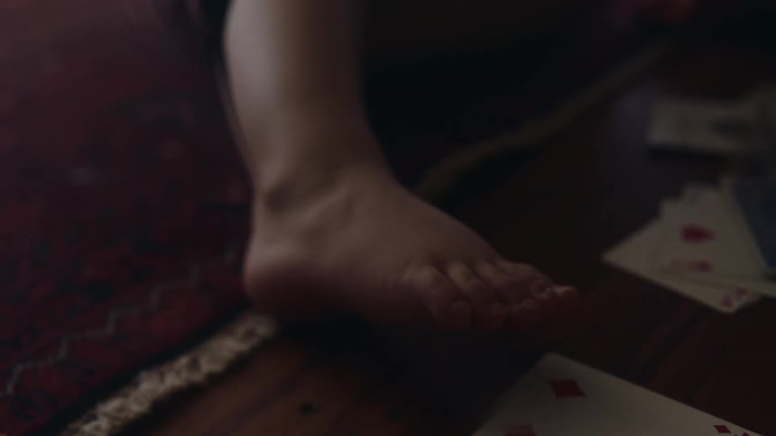 Cards are flipped on the ground
