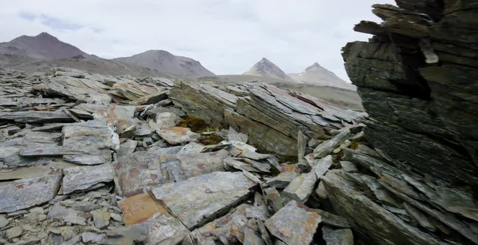 Shale rocks scattered on the ground in a mountain landscape