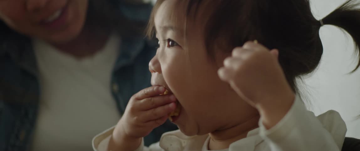 A child is eating some food