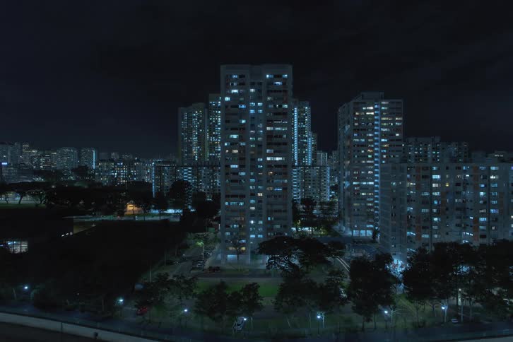 Time lapse of the night lights turning on buildings in the city skyline