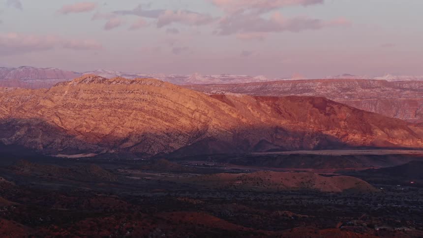 Aerial view of prominent Utah rock formations at sunset