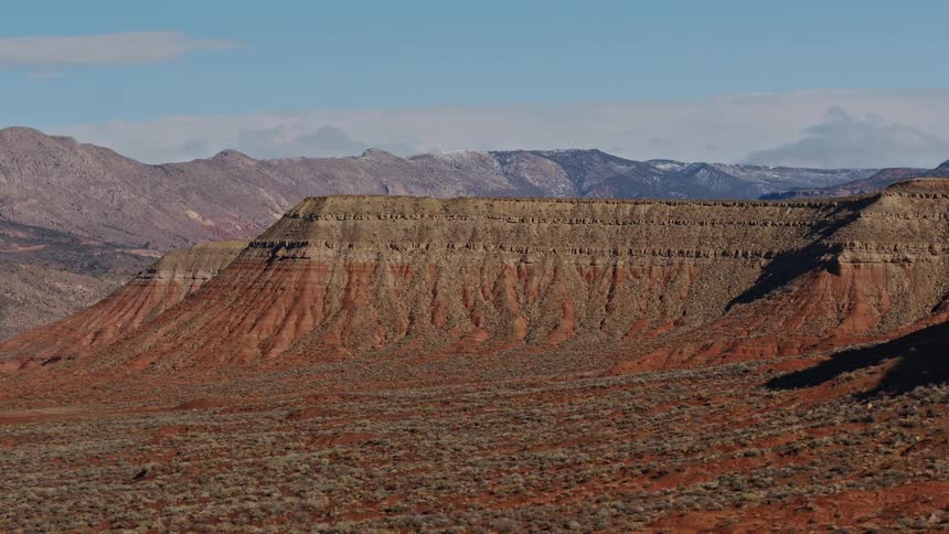 Aerial view of the ridges of a mountain in the desert badlands in the morning