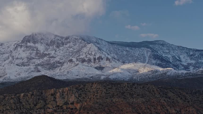 Aerial view of a snow covered mountain in the high altitude desert