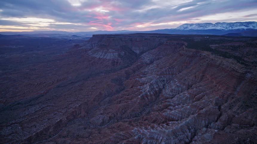 Aerial view of canyons and mountain plateau with beautiful sunset reveal
