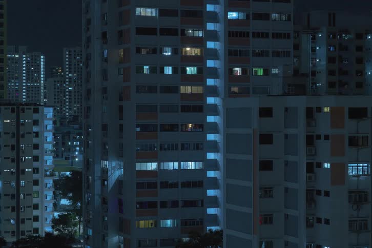 The lights turn off in the buildings