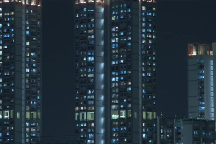 The view is of the downtown area and its night time with lights turning on