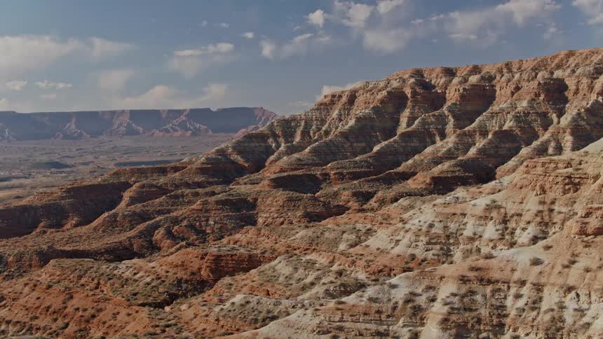 Aerial view of the ridges of a mountain in the desert badlands in the morning