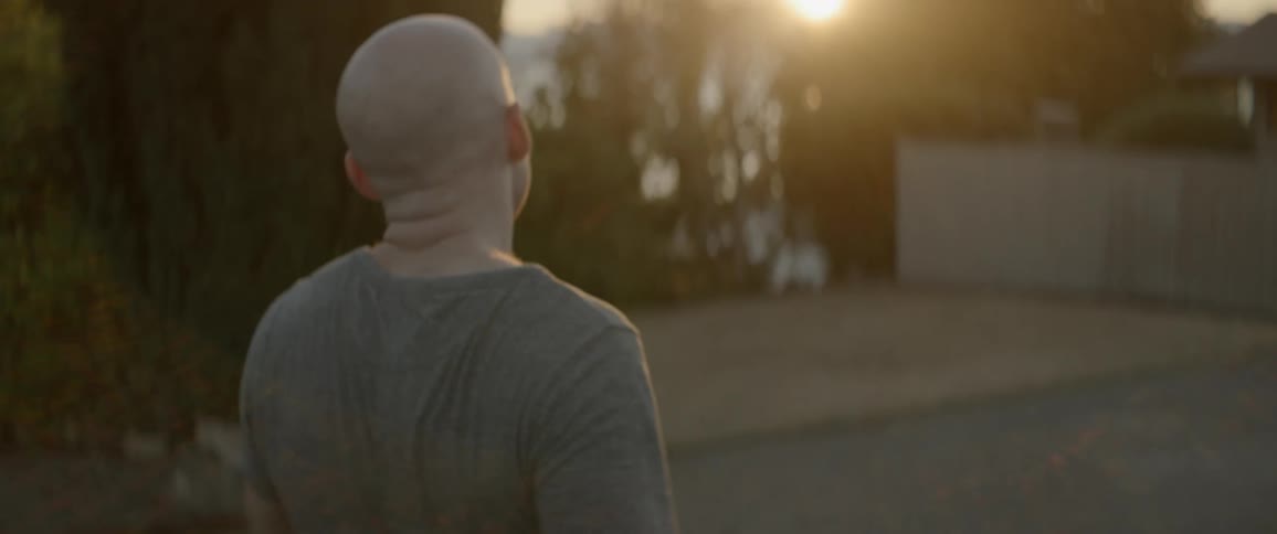 The man stops his run to watch the sunrise