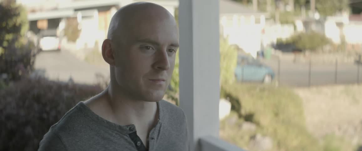 The man walks off his porch