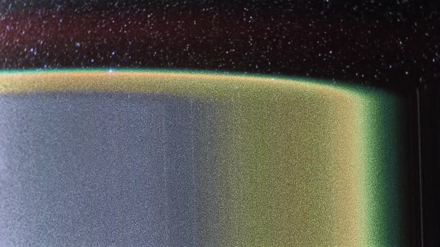 Lines float over multicolored surface as spots of light emerge