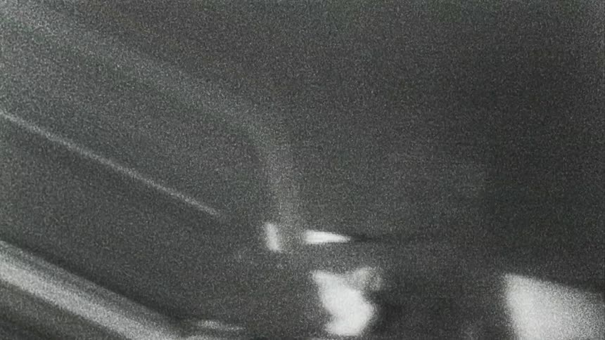 Distorted footage of the apollo lunar landing astronauts on the surface of the moon