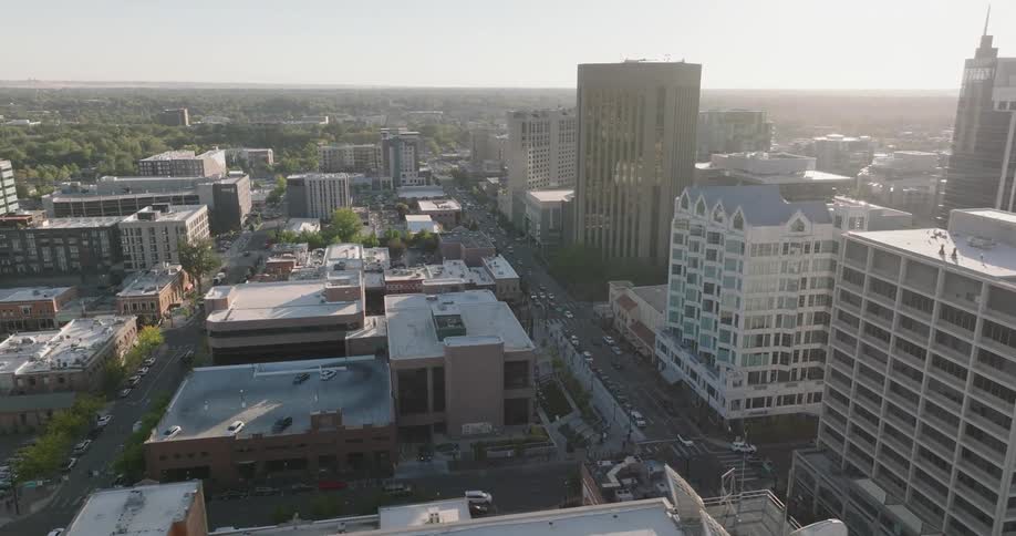 Aerial view of a downtown city is displayed in spring