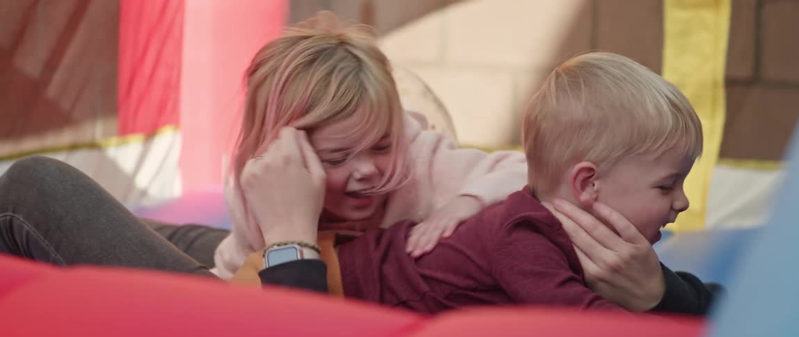 A family play together outside