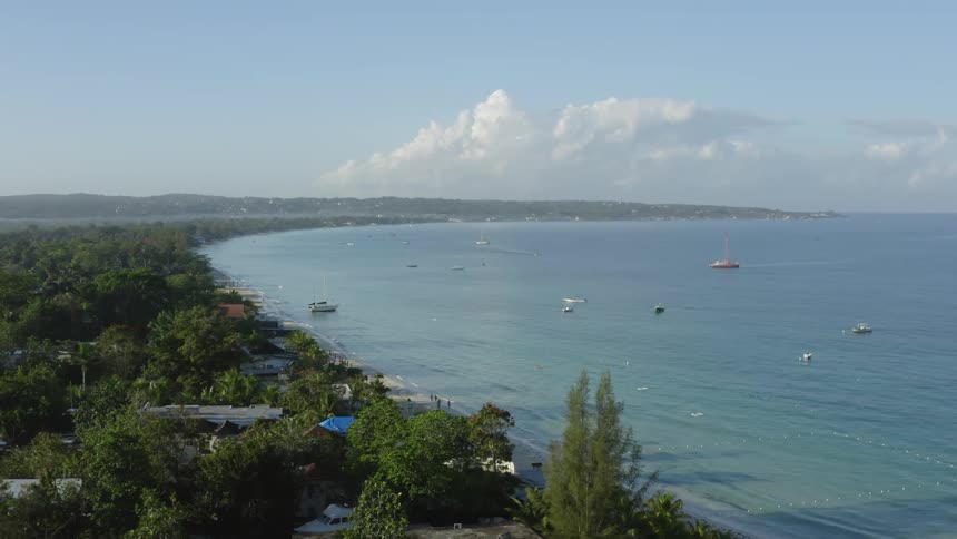 Aerial view of a city near the beach coast in spring