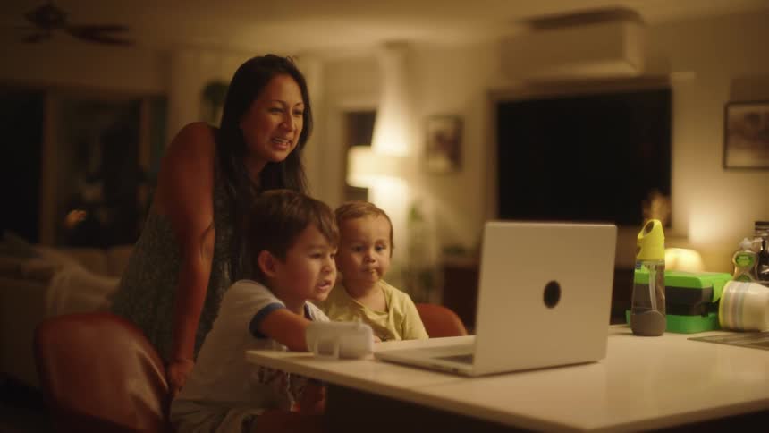 A family talk with people on the laptop