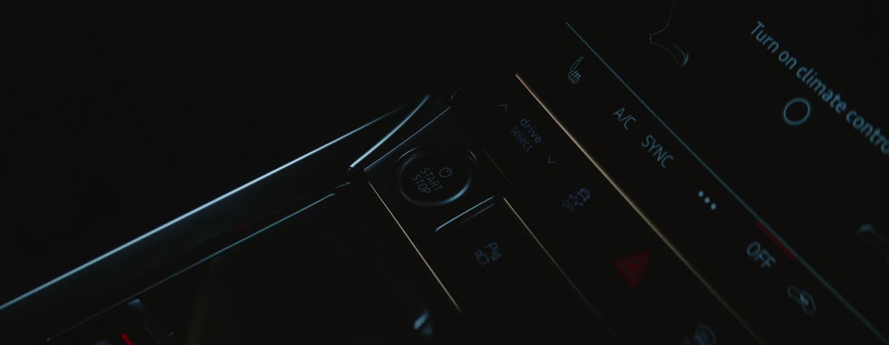 Close up of hand starting car