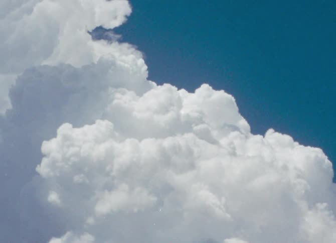 Cumulus clouds in a blue sky