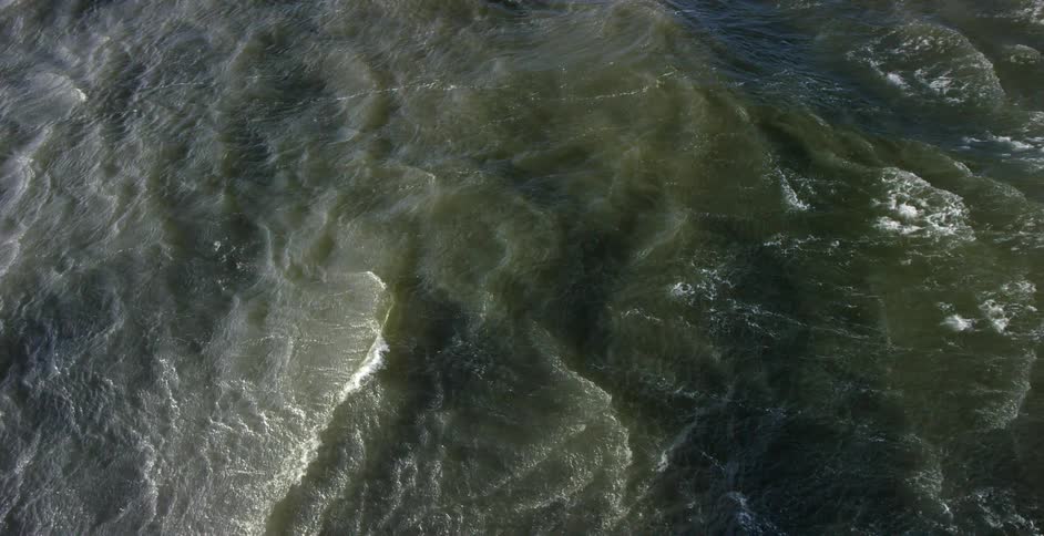 Aerial view of green ocean waves