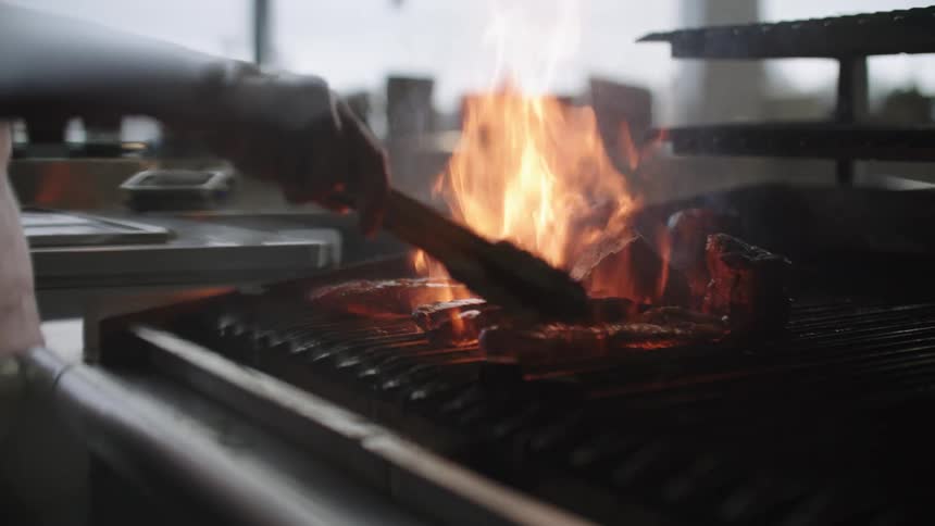 The view is of someone grilling inside of there home