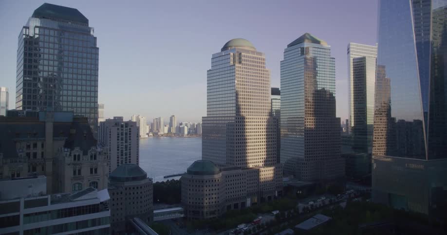 Mirrored skyscrapers along the coast reflect off each other