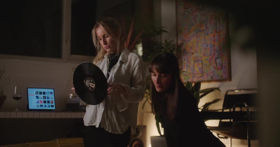 Women listen to records together