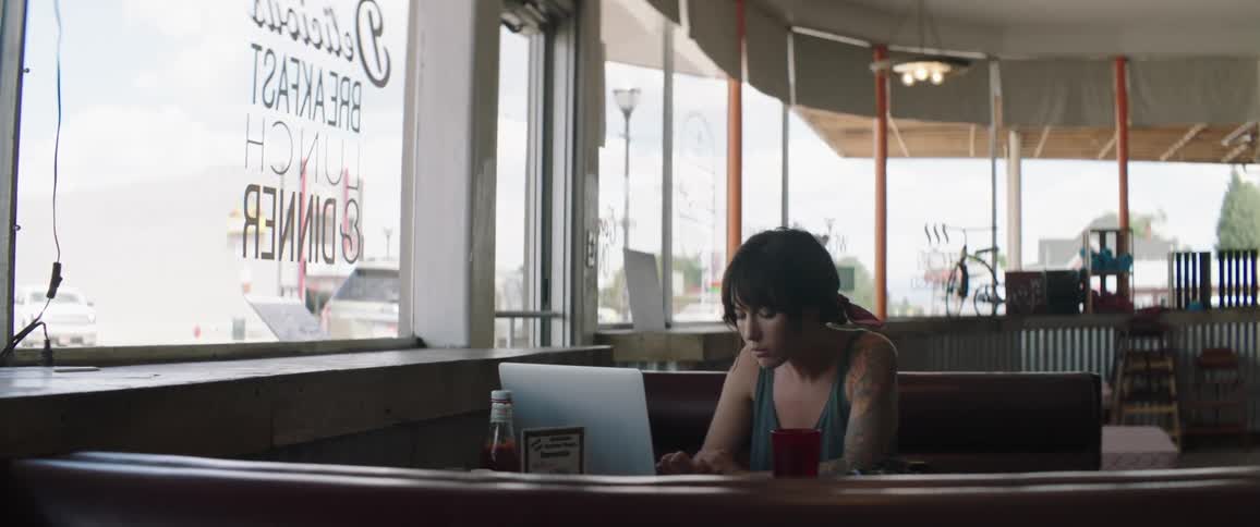 A woman working on a laptop