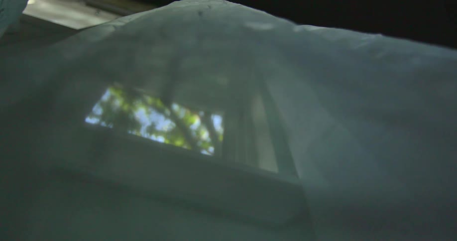 The curtains are blowing on this window