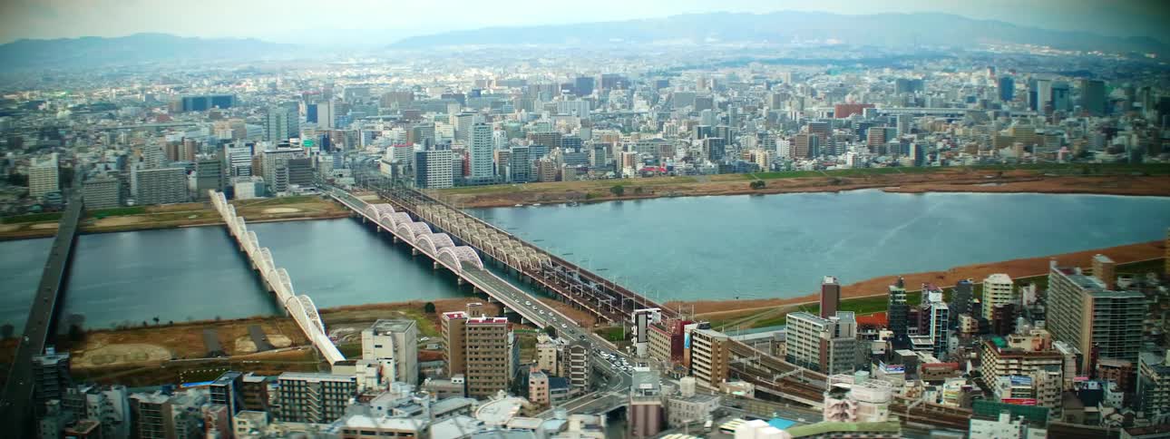 An aerial view of a downtown city is displayed