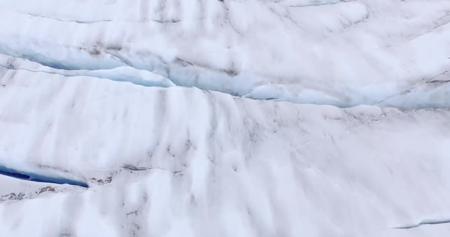 A large ice filled area has some cracks below