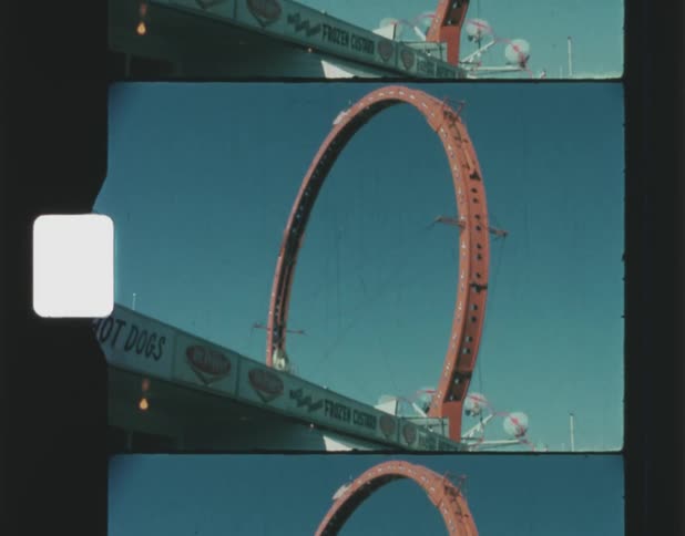 People are riding on the amusement rides