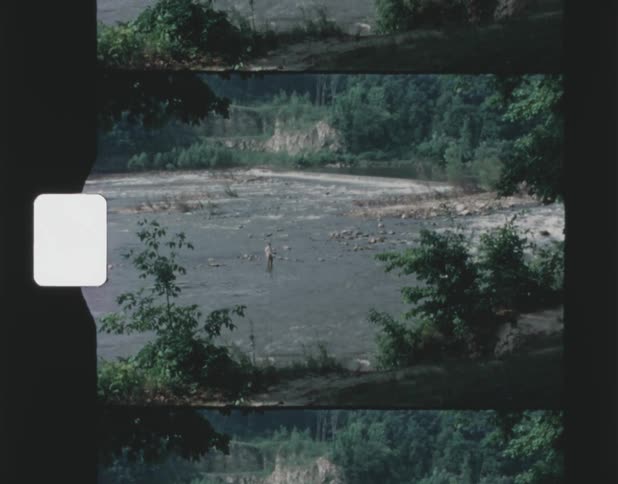 A man is fishing in the river