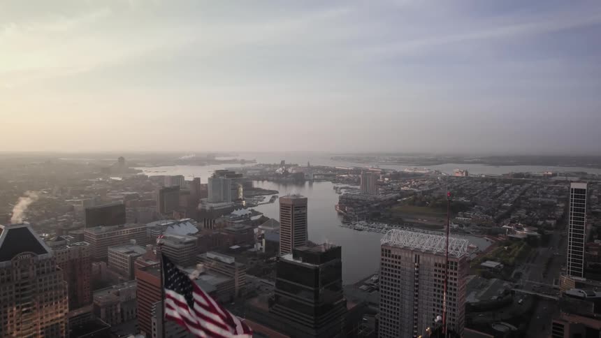 Aerial view of skyscrapers next to river inner harbor in the city