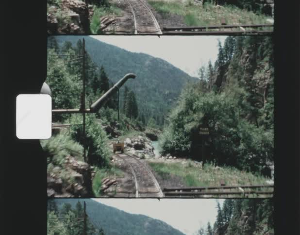 A car moves on the train tracks
