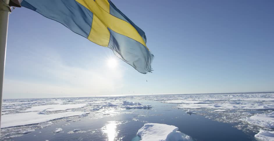 A blue and yellow flag flutters in the breeze