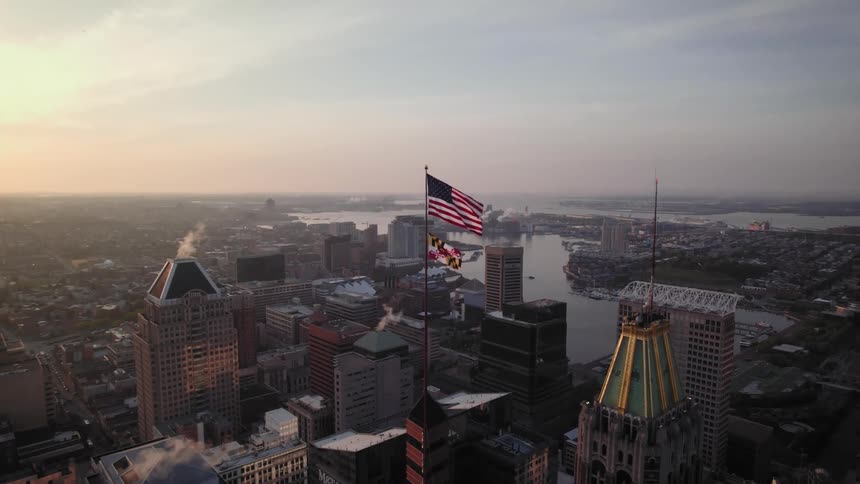 Baltimore Aerial view of a downtown city at dusk is displayed