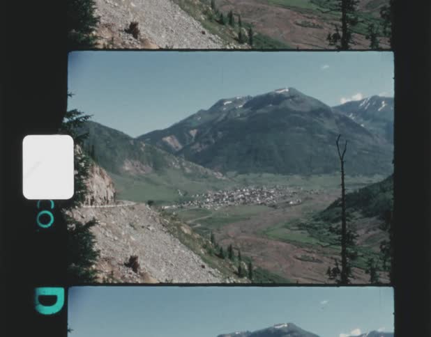 A small town is at the bottom of the mountain