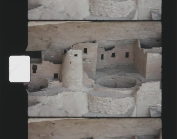 Abandoned archeological cliff town nestles in side of cliff