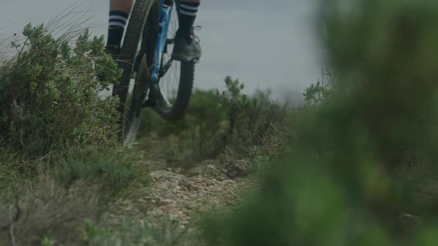 A man riding a bicycle outdoors