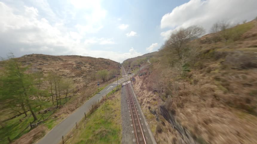 Aerial view of railway tracks in the field