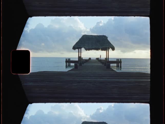The pier runs into the ocean