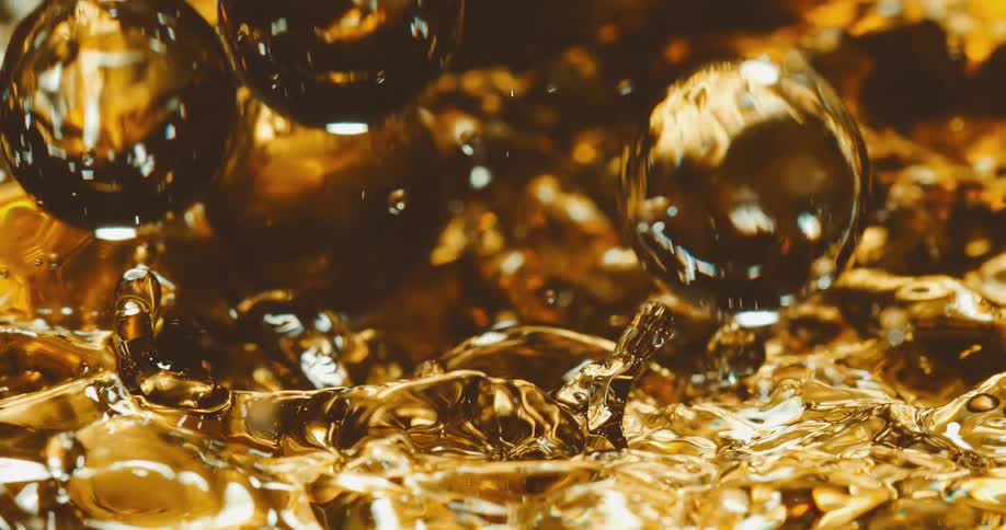Drops of honey on to liquid